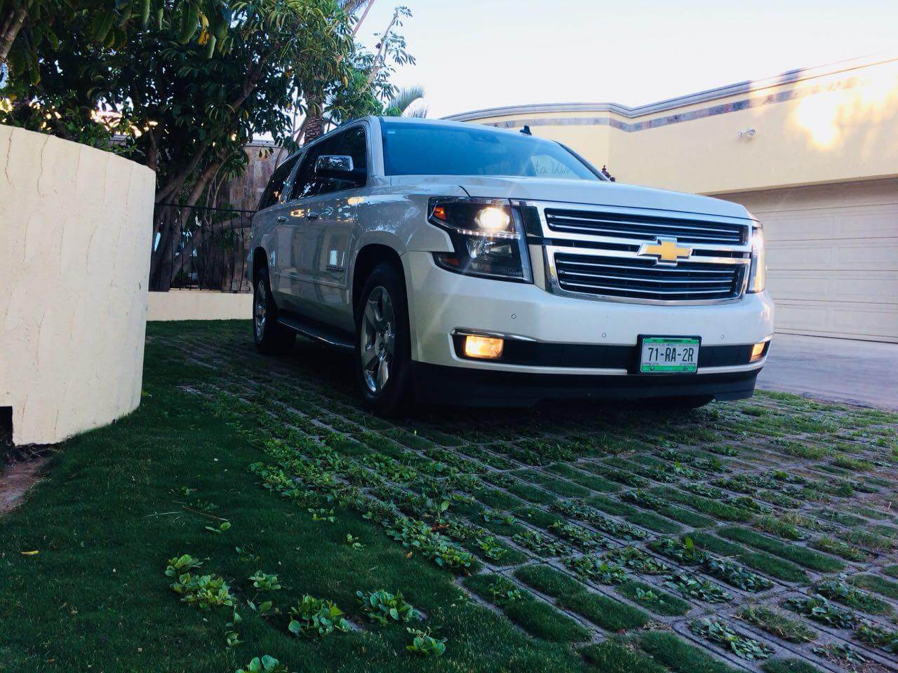 White Luxury Suburban arriving at hotel | Cabo Airport Transportation